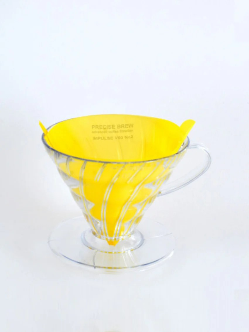 a yellow Precise Brew filter inside of a clear Hario V60 no2