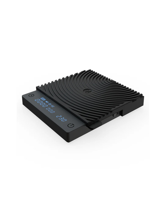black mirror mini scale turned on and showing a weight of 230g